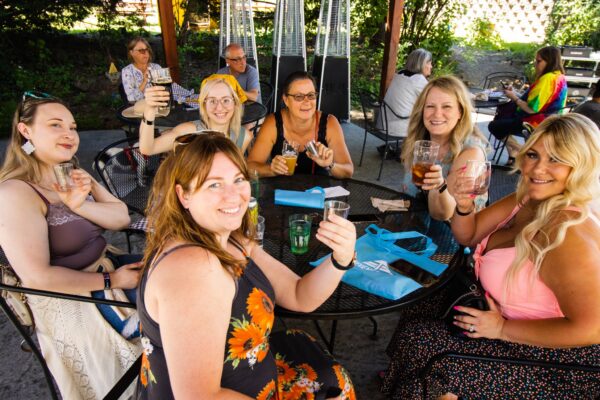 Group enjoying Skamania Sip + Stroll in Stevenson, Washington